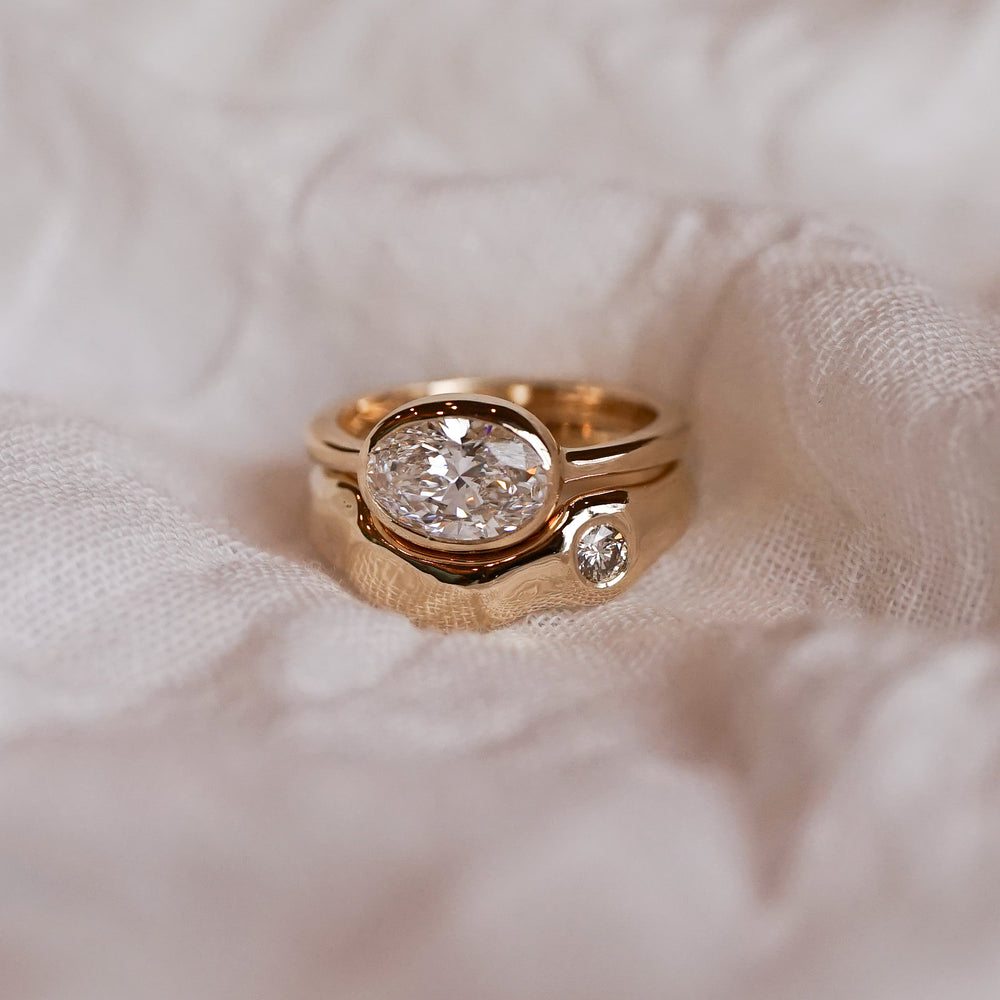 Top ring: laboratory grown diamond, 14ct yellow gold. Bottom ring: heirloom diamond, 14ct yellow gold.
