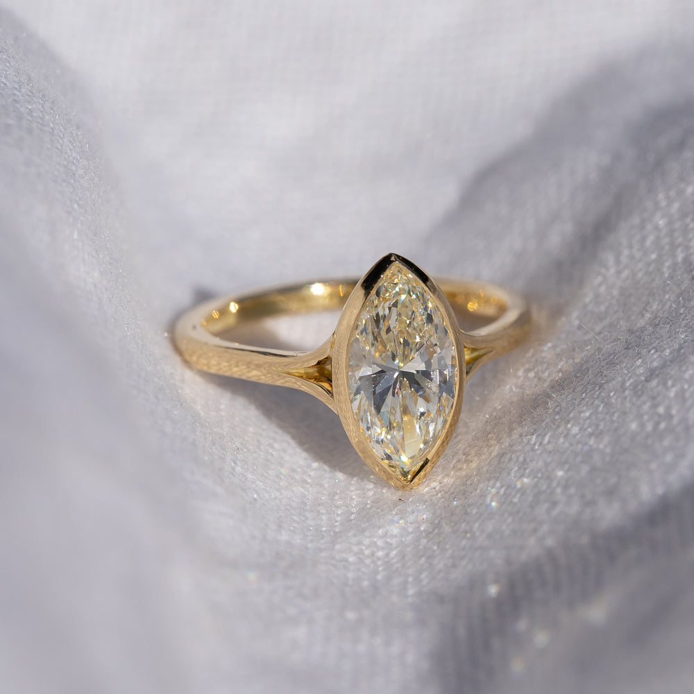 2 carat natural marquise diamond, 18ct yellow gold.