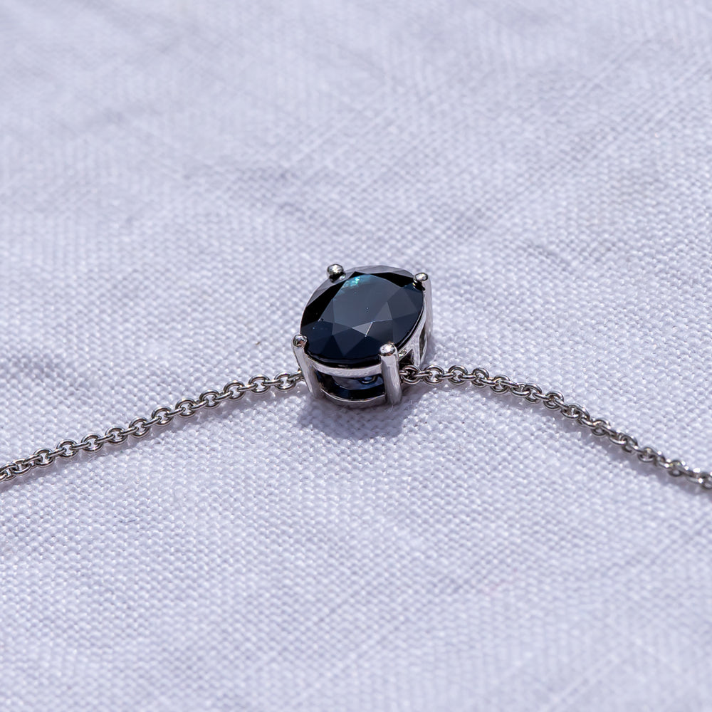 Platinum, heirloom sapphire.