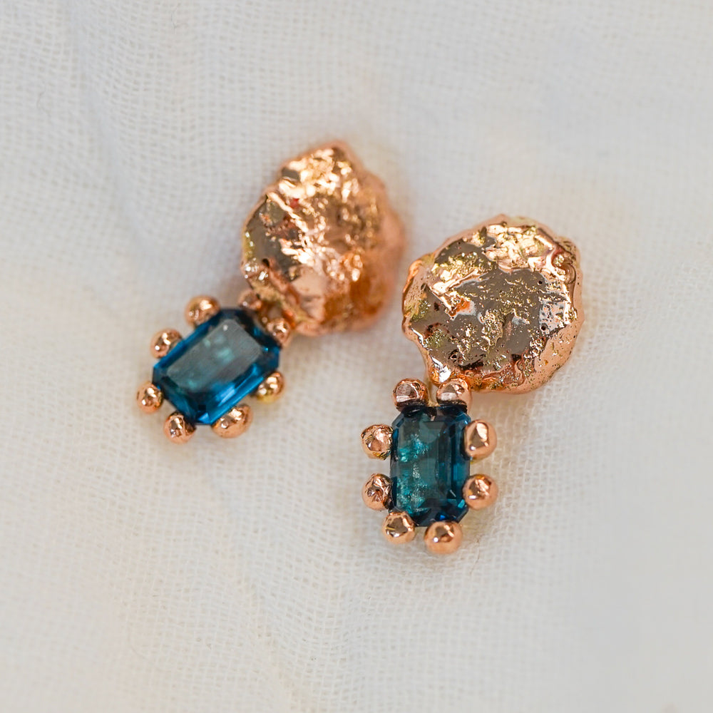 9ct rose gold, natural London blue topaz pair.